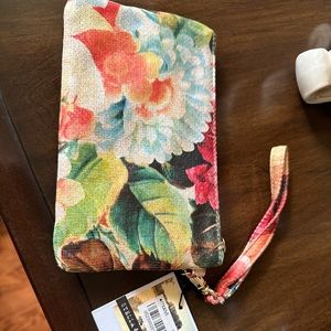 NWT Stella and max by mandi wristlet measures about 7by 4 inches.